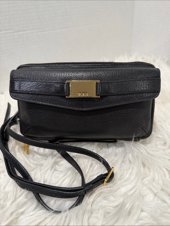 Tumi Handbags - TUMI Crossbody with Gold tone Logo Accent Plate